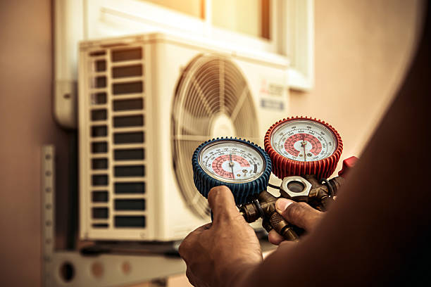 Professional Air Conditioning Service technician working in Lake Junaluska, NC